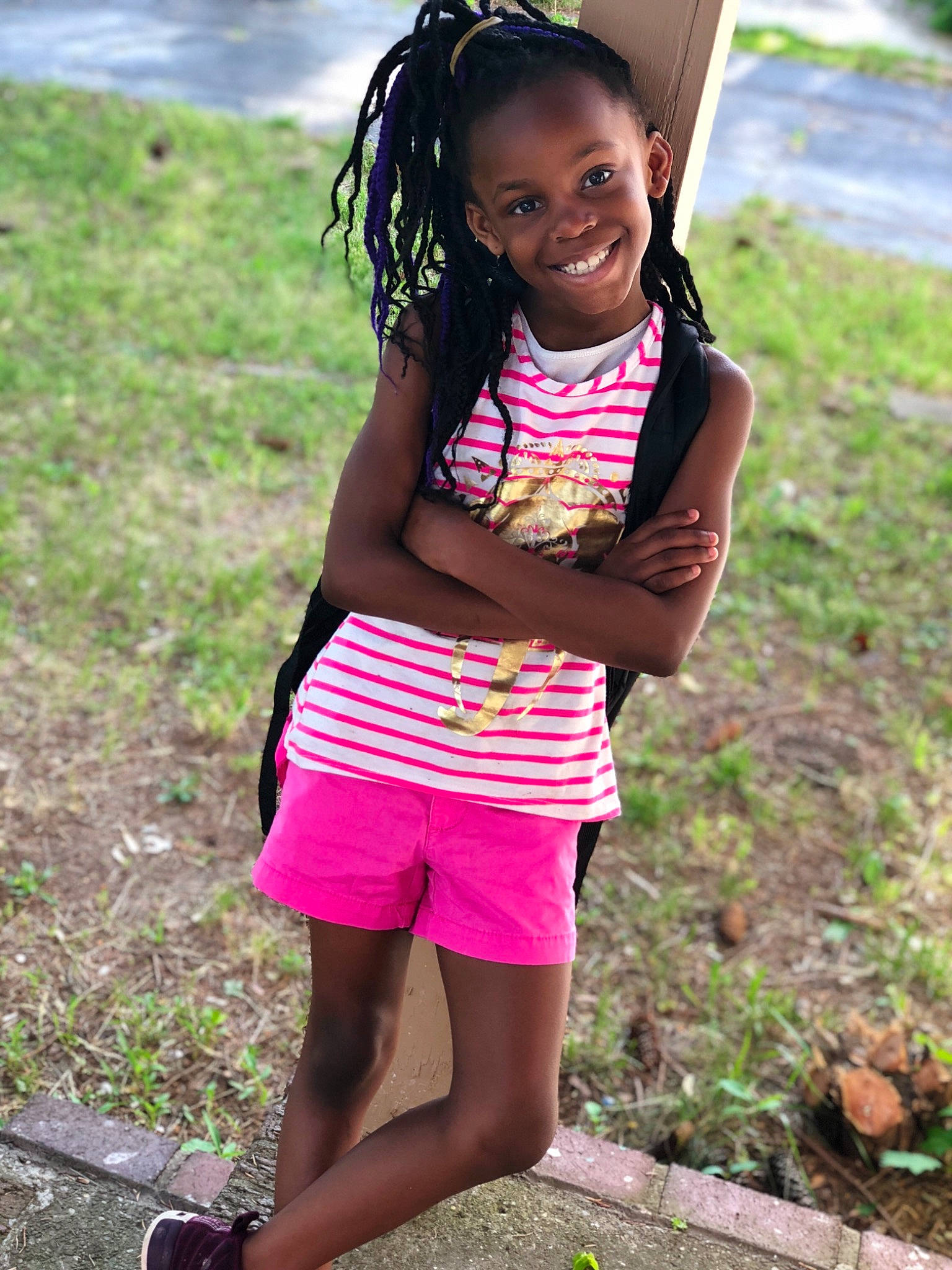 Kimya is registered to the contest to win money with this photo: abdomen, beauty, black_hair, child, facial_expression, fun, girl, grass, happiness, joy, leg, person, pink, play, shorts, shoulder, skin, smile, summer, thigh