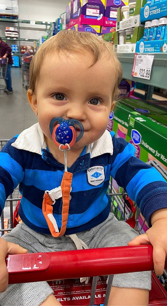 Zander joined the competition — help win amazing prizes! baby, baby_toddler_clothing, child, electric_blue, event, fun, happy, iris, leisure, logo, person, play, product, recreation, retail, sitting, skin, smile, t_shirt, toddler