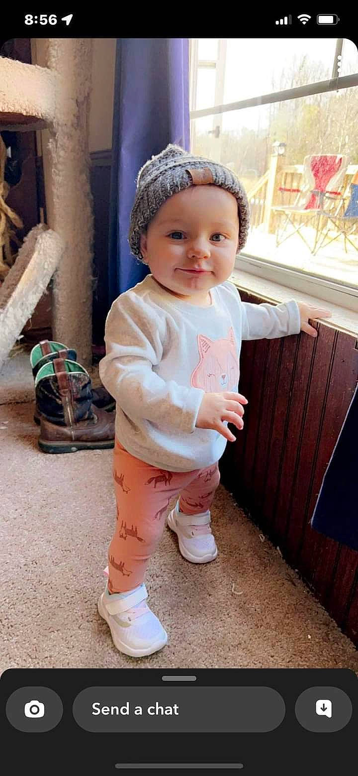 Madelyn joined the competition — help win amazing prizes! baby, baby_toddler_clothing, bag, cap, cheek, child, fashion_accessory, happy, headwear, human_leg, knee, luggage_and_bags, pattern, peach, person, sitting, skin, sleeve, smile, toddler