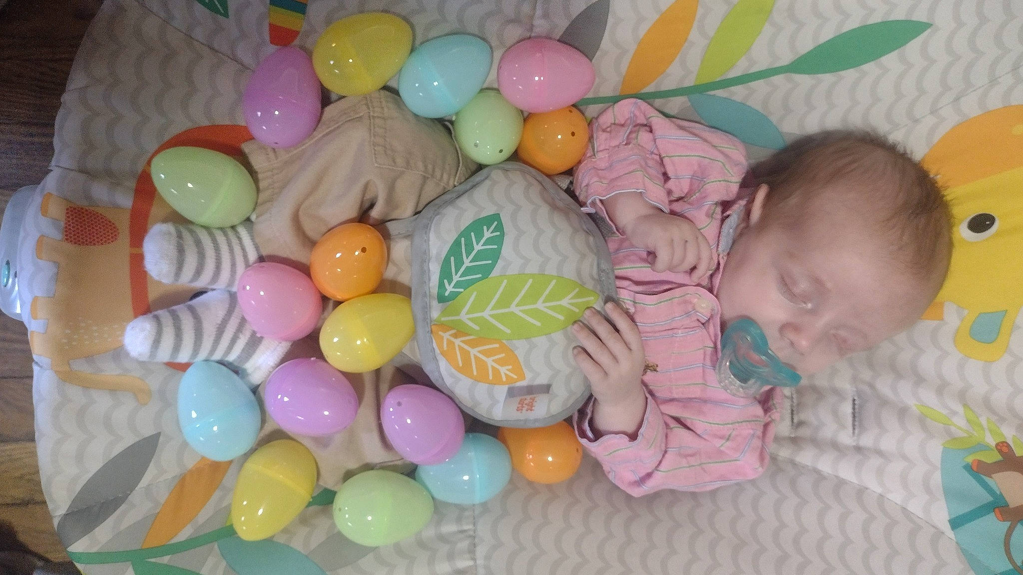 Wyatt is registered to the contest to win money with this photo: baby, baby_products, baby_toddler_clothing, baby_toys, balloon, child, circle, comfort, confectionery, dessert, event, food, fun, head, icing, ingredient, party_supply, person, pink, sweetness