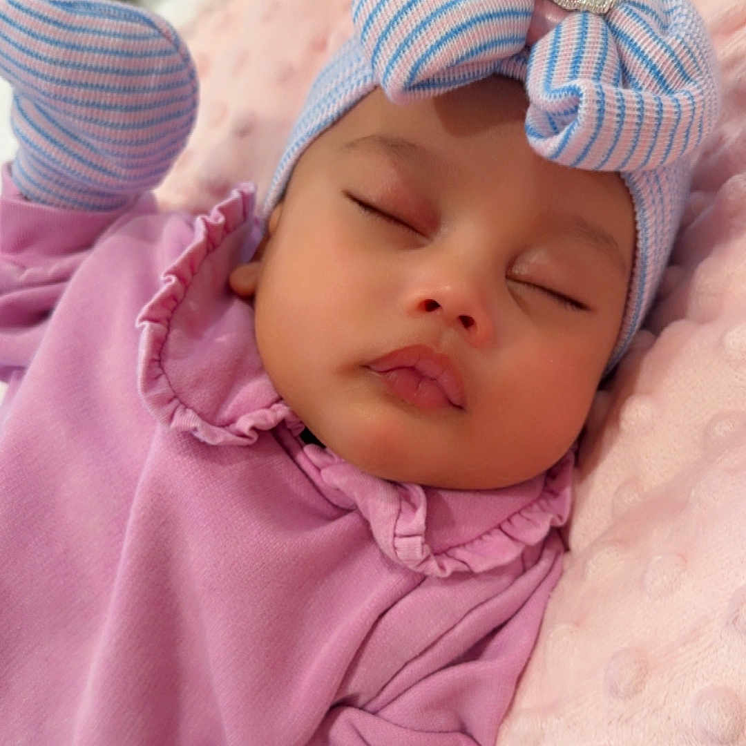 Calionna joined the competition — help win amazing prizes! baby, bed, blanket, bonnet, cap, clothing, face, furniture, glove, hat, head, hood, hoodie, knitwear, newborn, person, photography, portrait, quilt, sleeping