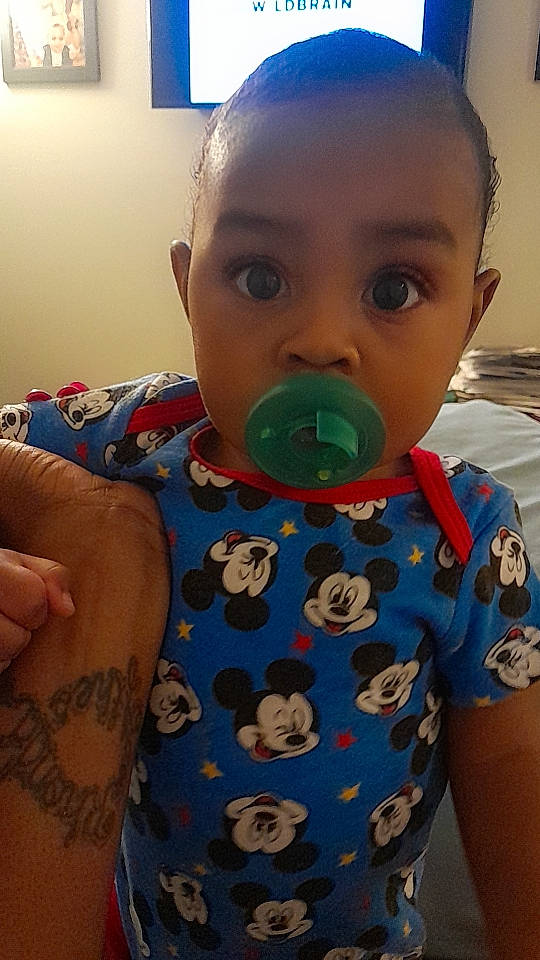 Cayden joined the competition — help win amazing prizes! arm, baby, baby_toddler_clothing, cheek, chin, cool, drinkware, facial_expression, finger, hairstyle, hand, mouth, neck, nose, organ, outerwear, person, shirt, skin, sleeve