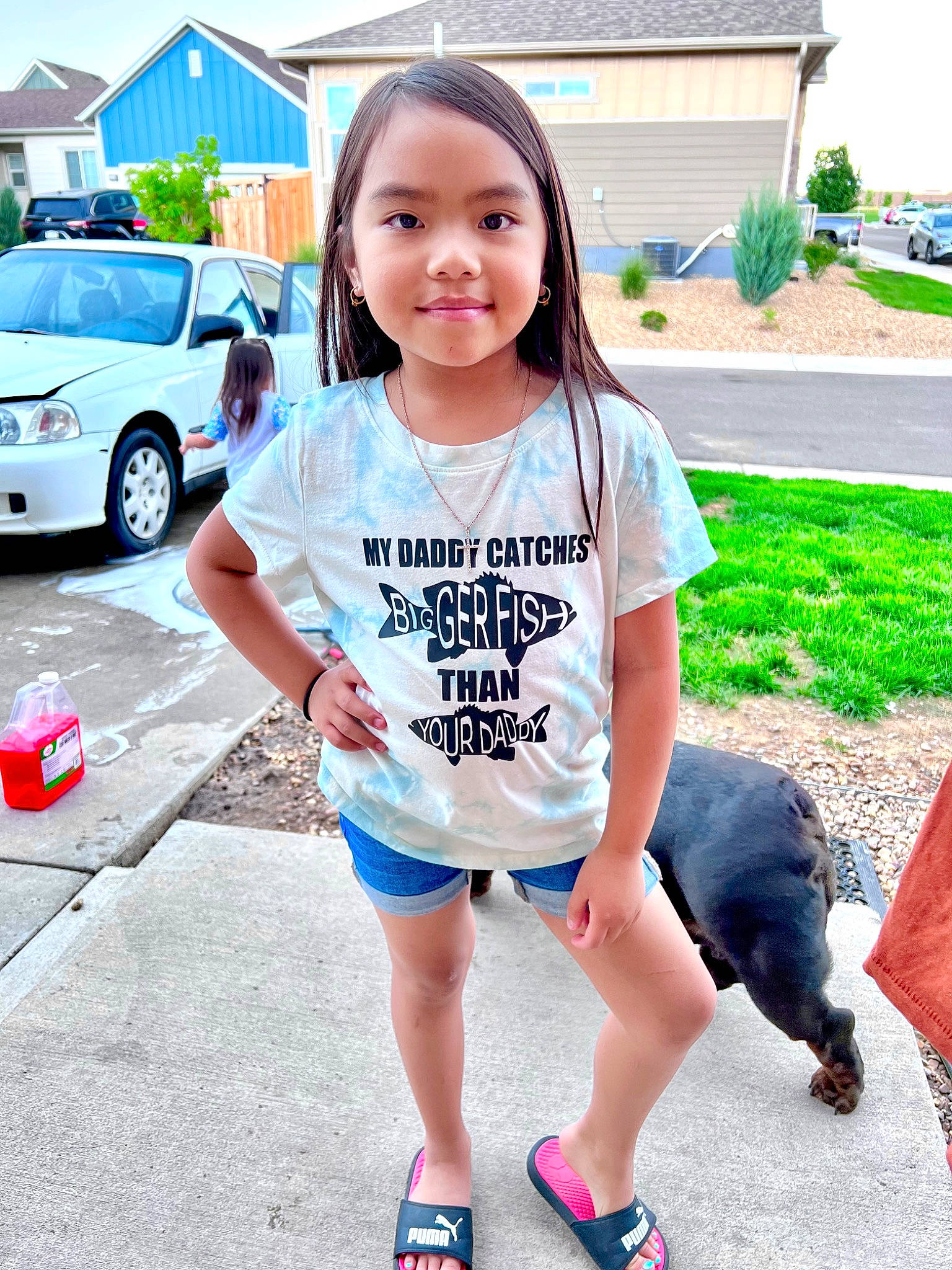 Rylie joined the competition — help win amazing prizes! asphalt, blue, car, electric_blue, happy, human_leg, joy, leg, leisure, motor_vehicle, person, plant, shoe, sleeve, sneakers, sportswear, summer, t_shirt, thigh, tire