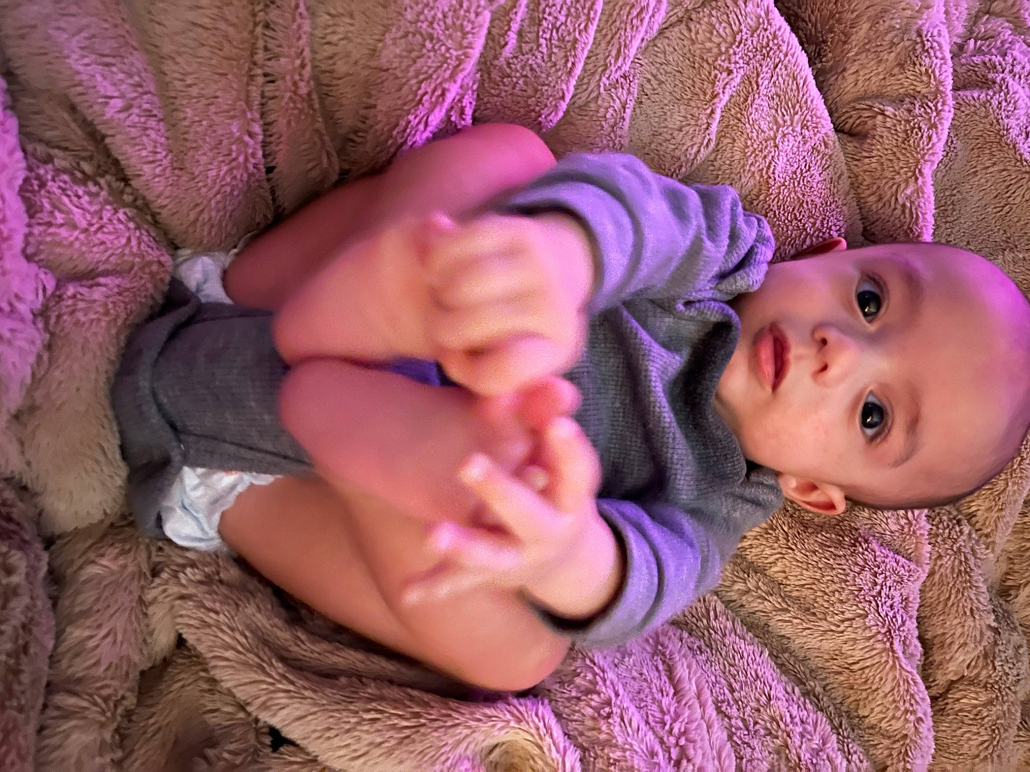 Bruce is registered to the contest to win money with this photo: baby, baby_toddler_clothing, cheek, child, comfort, eye, eyelash, finger, gesture, hand, magenta, nail, person, pink, purple, skin, sleeve, textile, thumb, toddler