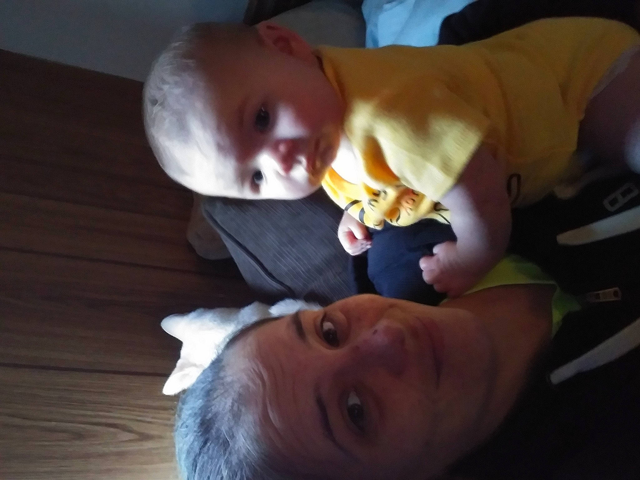 James is registered to the contest to win money with this photo: abdomen, baby, baby_products, baby_toddler_clothing, cheek, child, comfort, ear, fun, gesture, happy, hardwood, iris, joy, leg, mouth, nose, person, skin, toddler