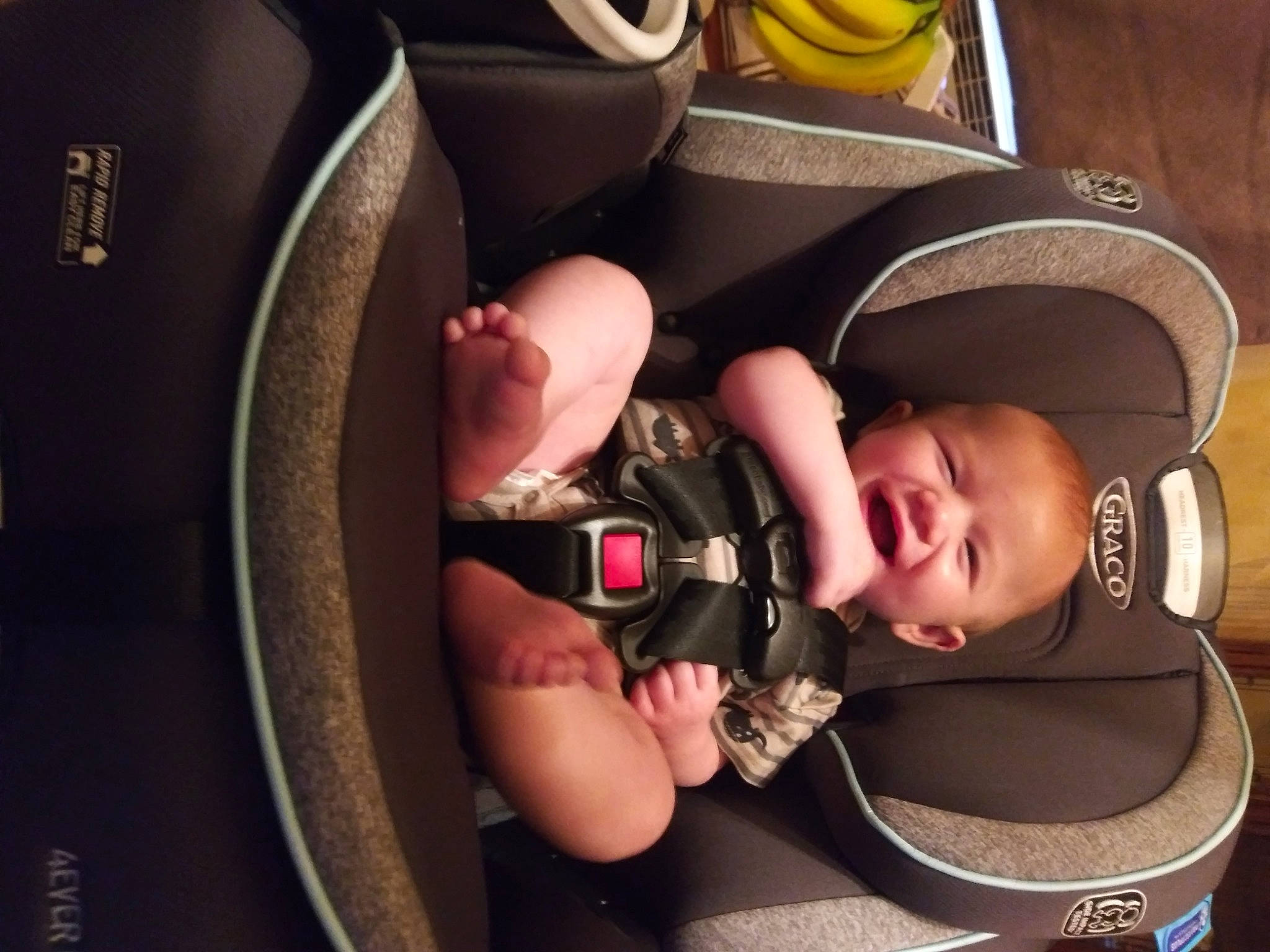 James is registered to the contest to win money with this photo: audio_equipment, auto_part, automotive_design, baby, baby_carriage, car_seat, comfort, eyelash, eyewear, finger, flash_photography, hand, hat, headgear, helmet, nail, person, steering_wheel, sunglasses, thigh