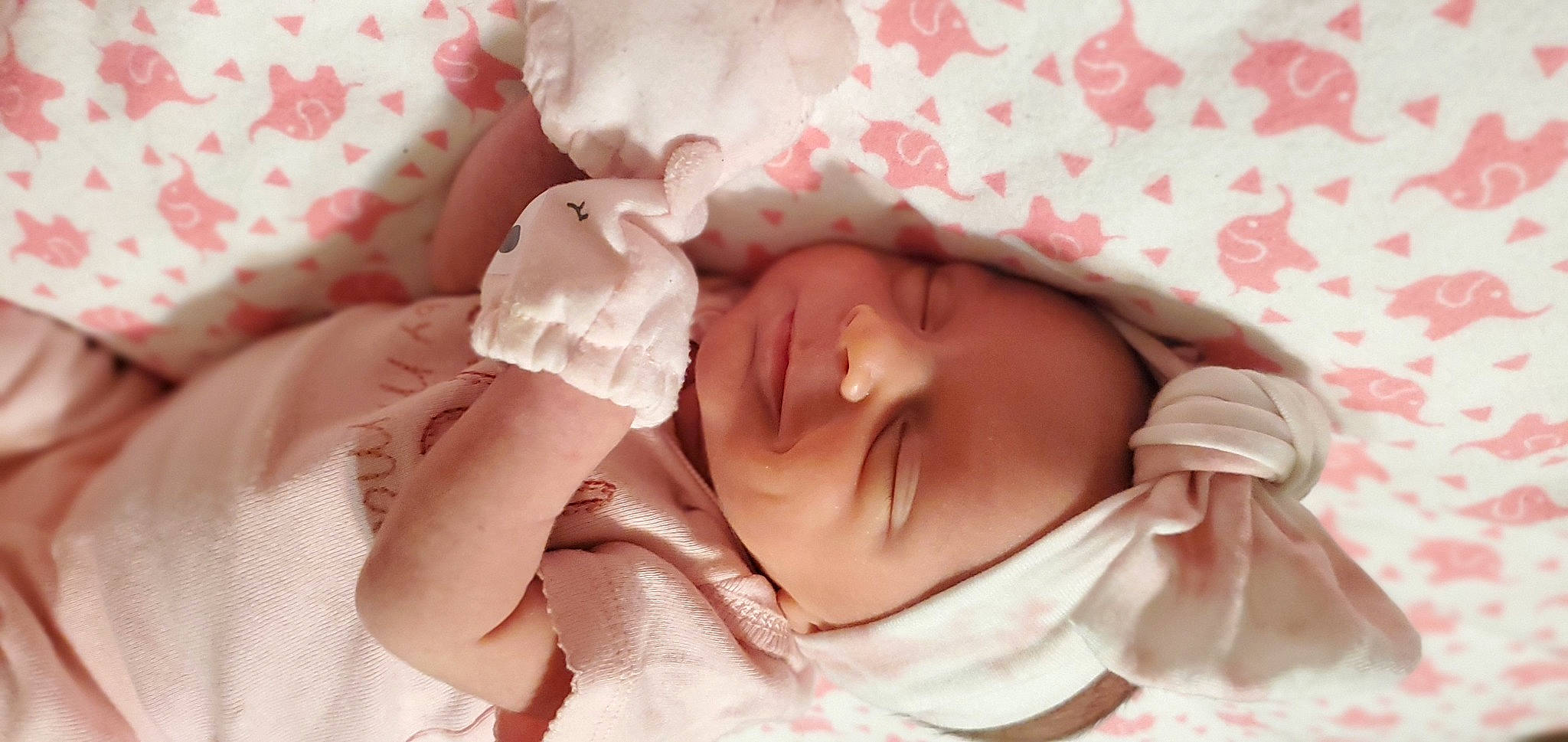 Hailey joined the competition — help win amazing prizes! baby, baby_sleeping, baby_toddler_clothing, bedtime, cheek, child, comfort, happy, headgear, linens, lip, pattern, peach, person, pink, room, skin, sleep, sweetness, textile