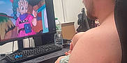 Pedro joined the competition — help win amazing prizes! anime, baby, baby_holding, cartoon, casual, chair, computer, desk, glasses, indoor, keyboard, man, monitor, parenting, relaxing, screen, shirtless, technology, watching, water_bottle
