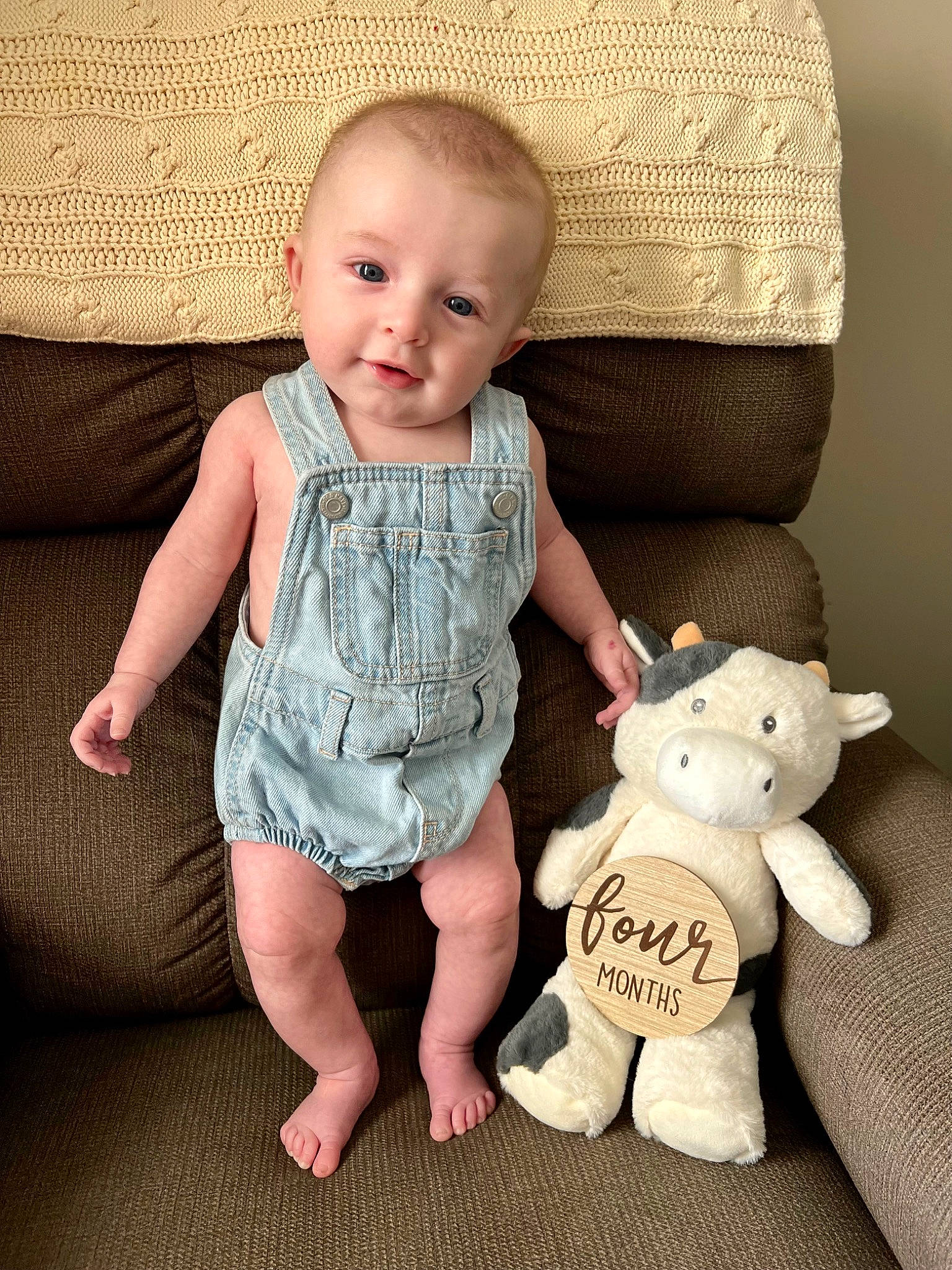 Cooper is registered to the contest to win money with this photo: baby, baby_toddler_clothing, cheek, child, clothing, comfort, flash_photography, happy, head, human_body, person, sitting, skin, sleeve, smile, t_shirt, teddy_bear, textile, toddler, toy