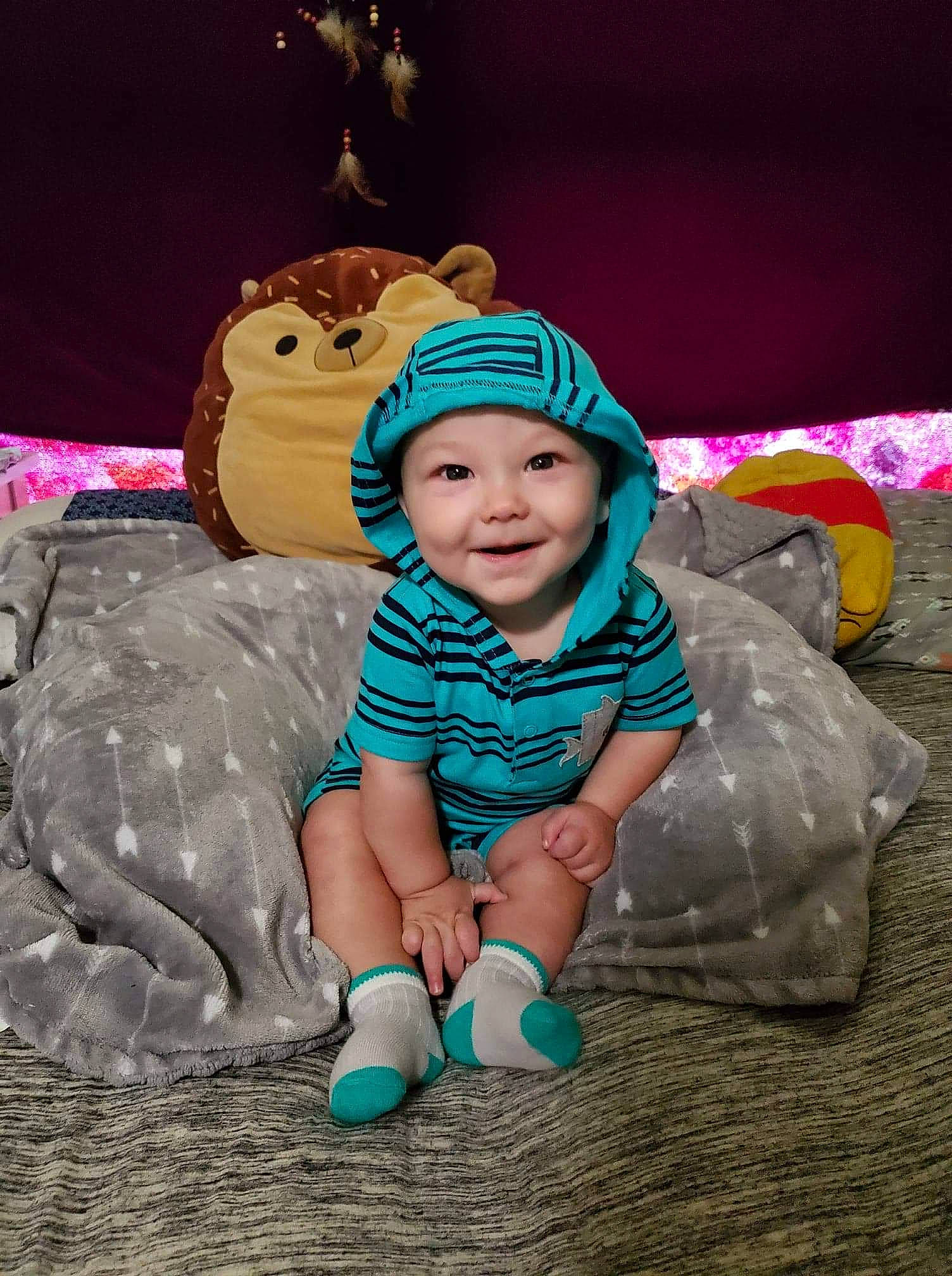 Aidyn joined the competition — help win amazing prizes! baby, cheek, child, fun, happy, headgear, headwear, joy, person, pink, play, sitting, skin, smile, toddler, tourism, tree, vacation