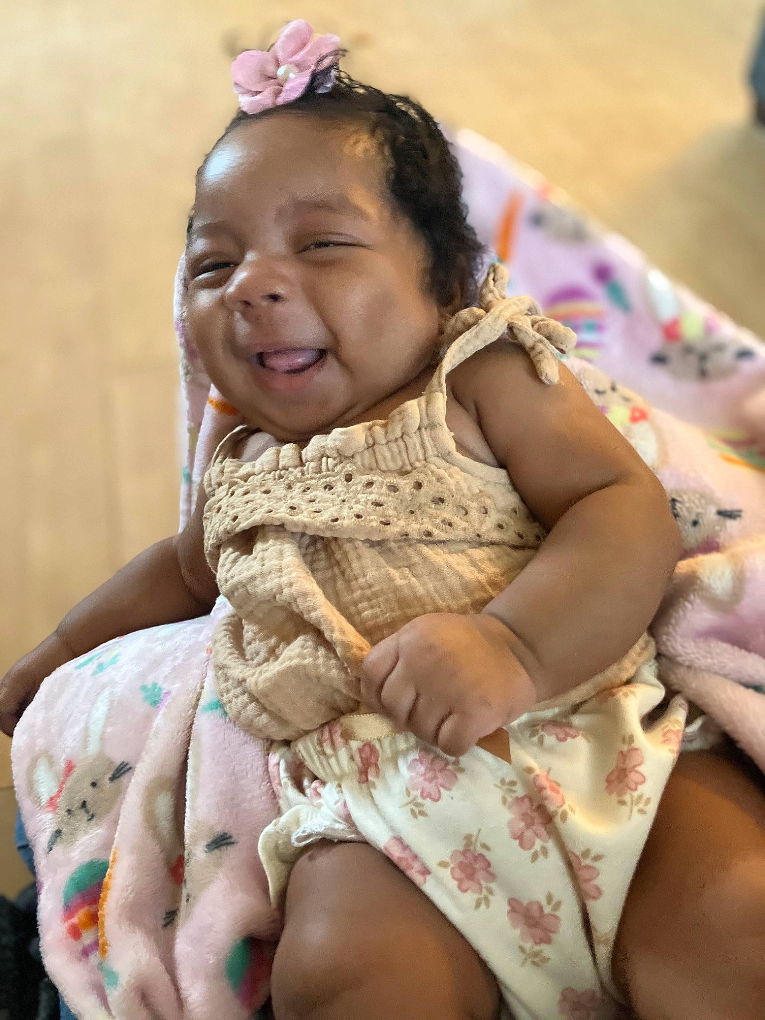 Michaela is registered to the contest to win money with this photo: baby, baby_toddler_clothing, child, dress, event, eye, fashion_accessory, fun, grass, happy, headgear, human_leg, jewellery, necklace, people, person, pink, sitting, skin, toddler