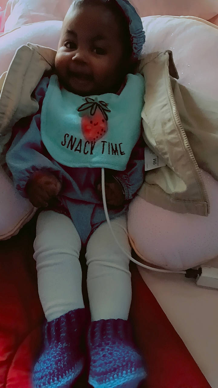 Cauri is registered to the contest to win money with this photo: baby, baby_toddler_clothing, chest, child, comfort, happy, human_leg, knee, leg, nail, person, pink, skin, sleeve, smile, sock, sportswear, textile, thigh, toddler