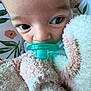 Elianna joined the competition — help win amazing prizes! baby, pacifier, blanket, close_up, face, infant, child, pink, white, green, texture, soft, cute, eyes, portrait, indoor, cozy, floral_background, comfort, snuggle