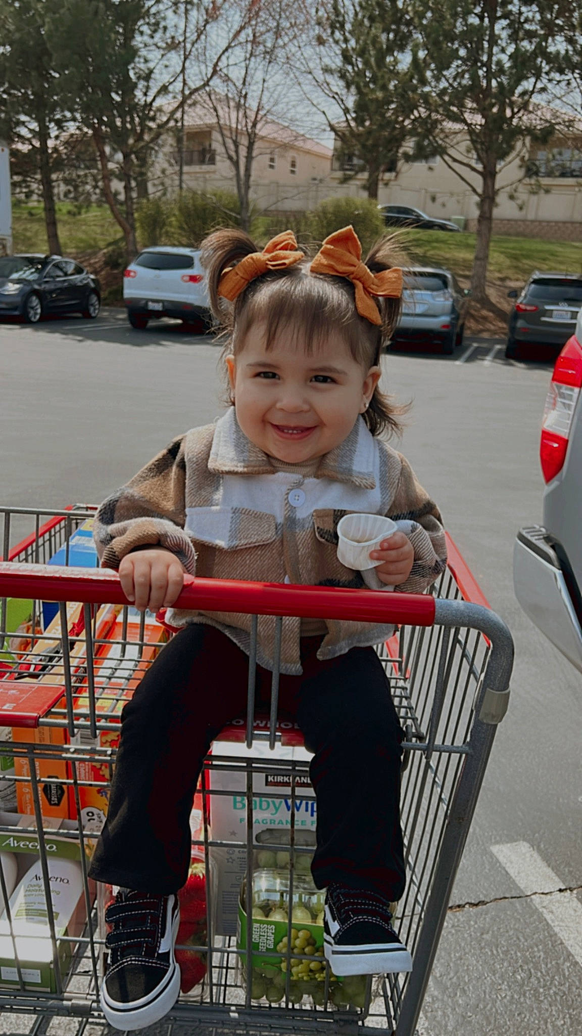 Mia AnahÍ is registered to the contest to win money with this photo: car, chair, child, event, furniture, joy, leisure, motor_vehicle, outdoor_furniture, person, plant, recreation, sitting, sky, smile, snapshot, tire, toddler, tree, vehicle