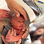 Noah a rejoint le concours — aidez-le/la à gagner de superbes lots ! newborn, baby, infant, hands, tattoo, sink, water, bath, pacifier, skin, person, closeup, care, parent, holding, small, cute, fresh, family, tender