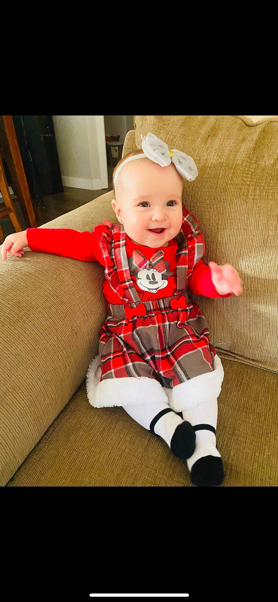 Lucy joined the competition — help win amazing prizes! baby, baby_toddler_clothing, child, christmas, comfort, couch, event, face, happy, hat, holiday, joy, knee, lap, pattern, person, sleeve, smile, sock, textile