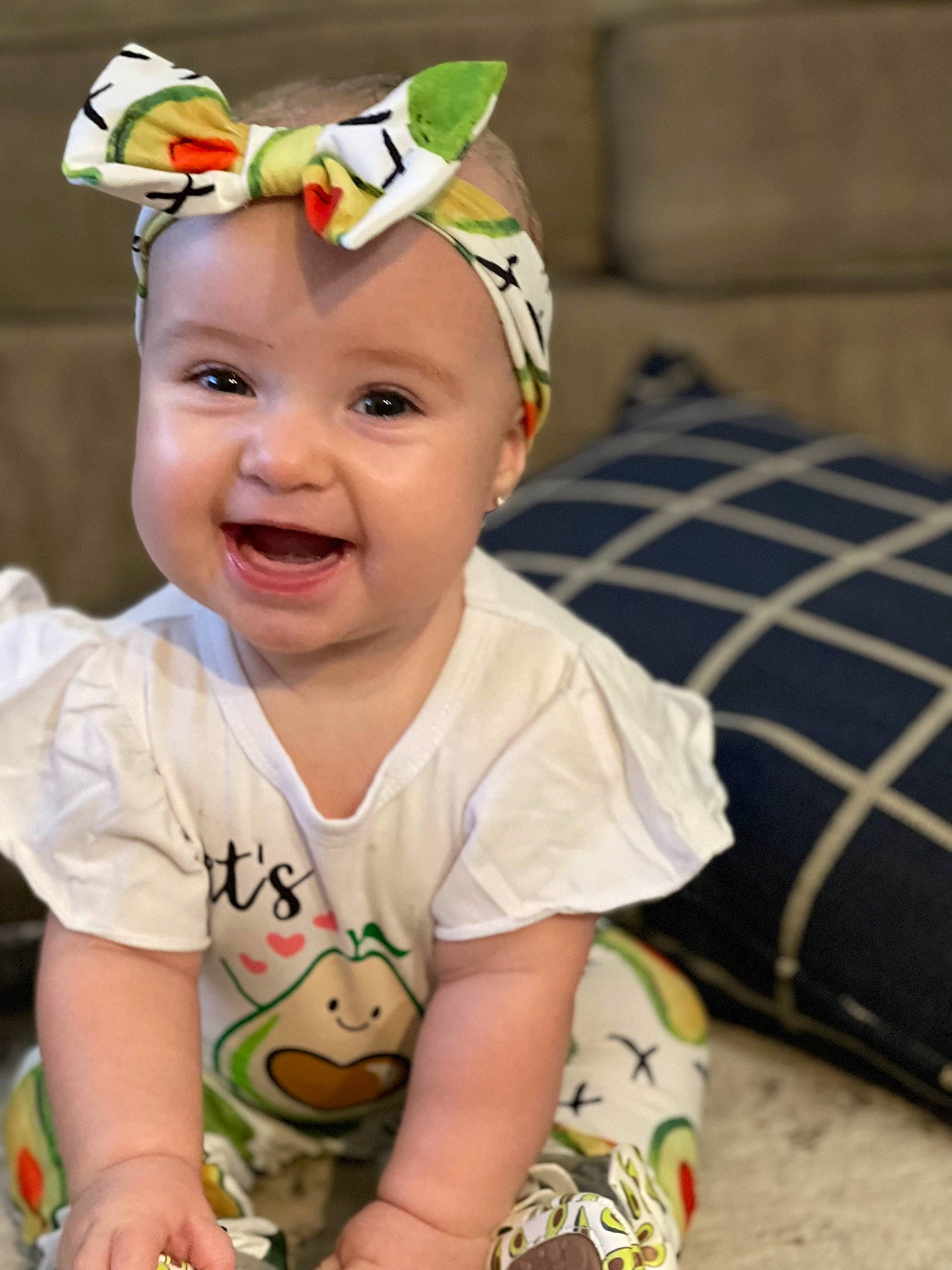 Lucy is registered to the contest to win money with this photo: baby, baby_toddler_clothing, cap, child, eye, fun, goggles, grass, happy, hat, head, headband, headwear, human_body, iris, person, skin, sleeve, smile, sunglasses