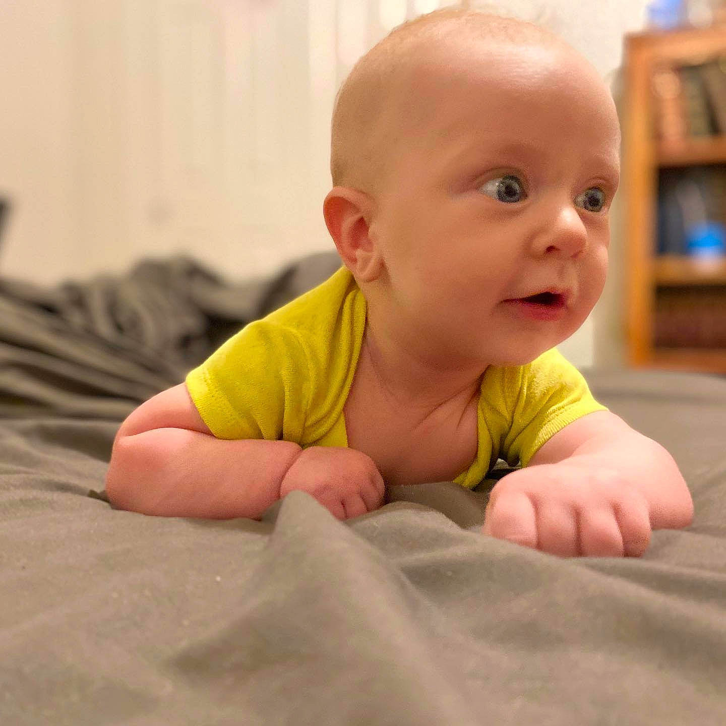 Jordan joined the competition — help win amazing prizes! arm, baby, cheek, child, chin, crawling, ear, face, finger, head, mouth, nose, person, skin, surprise, toddler, tummy_time