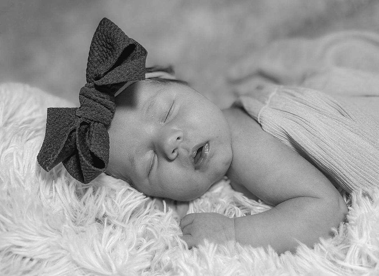 Haizley is registered to the contest to win money with this photo: baby, black_and_white, child, cloud, comfort, eye, facial_expression, flash_photography, grass, grey, hairstyle, happy, head, headgear, iris, linens, lip, person, skin, toddler