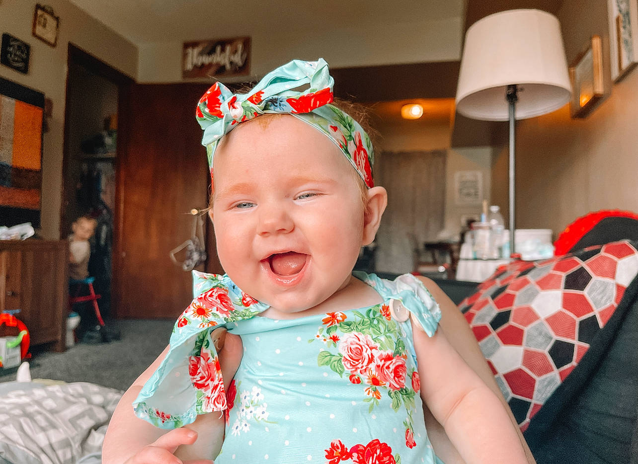 Haizley joined the competition — help win amazing prizes! baby, baby_toddler_clothing, birthday, child, costume_hat, event, fun, happy, headwear, holiday, lamp, laugh, orange, party_supply, pattern, person, pink, red, room, shelf