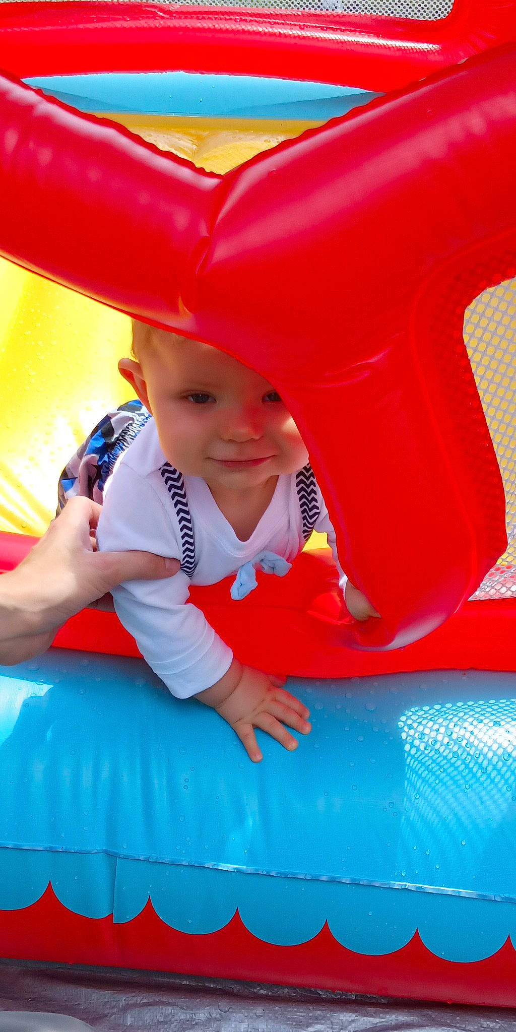 Lucius is registered to the contest to win money with this photo: child, fun, games, inflatable, joy, leisure, outdoor_play_equipment, person, play, recreation, toddler
