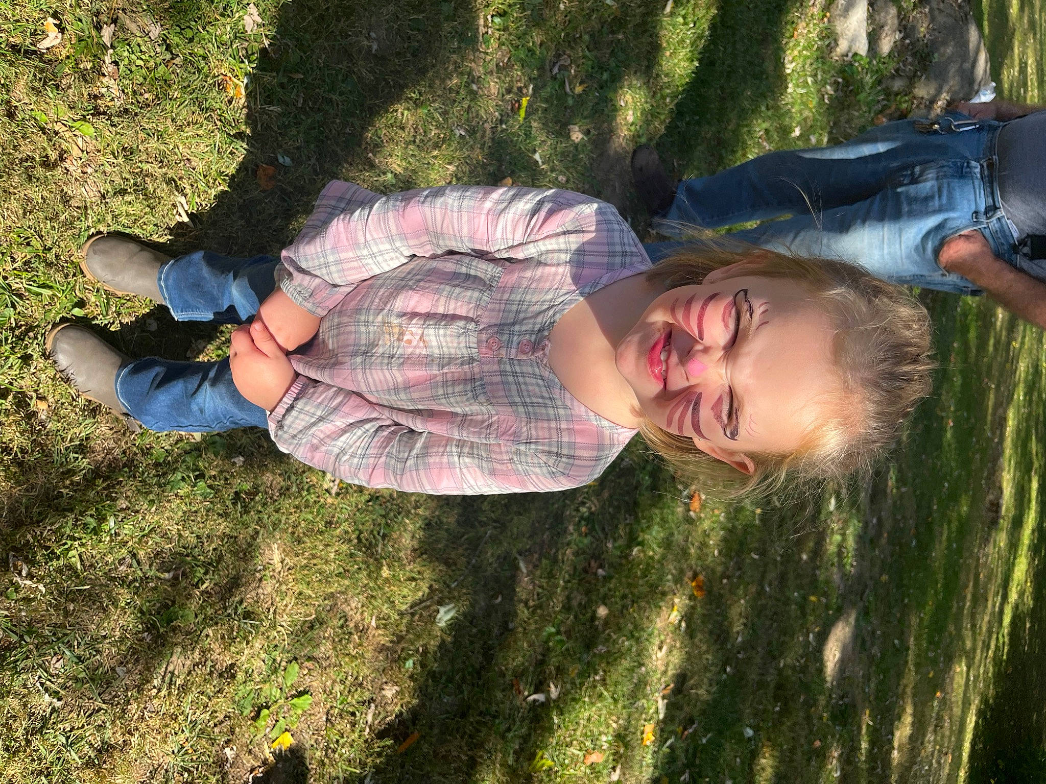 Eva June is registered to the contest to win money with this photo: child, fun, grass, grass_family, grassland, happy, joy, landscape, lawn, leaf, leisure, meadow, people_in_nature, person, plant, shadow, smile, soil, sunlight, toddler