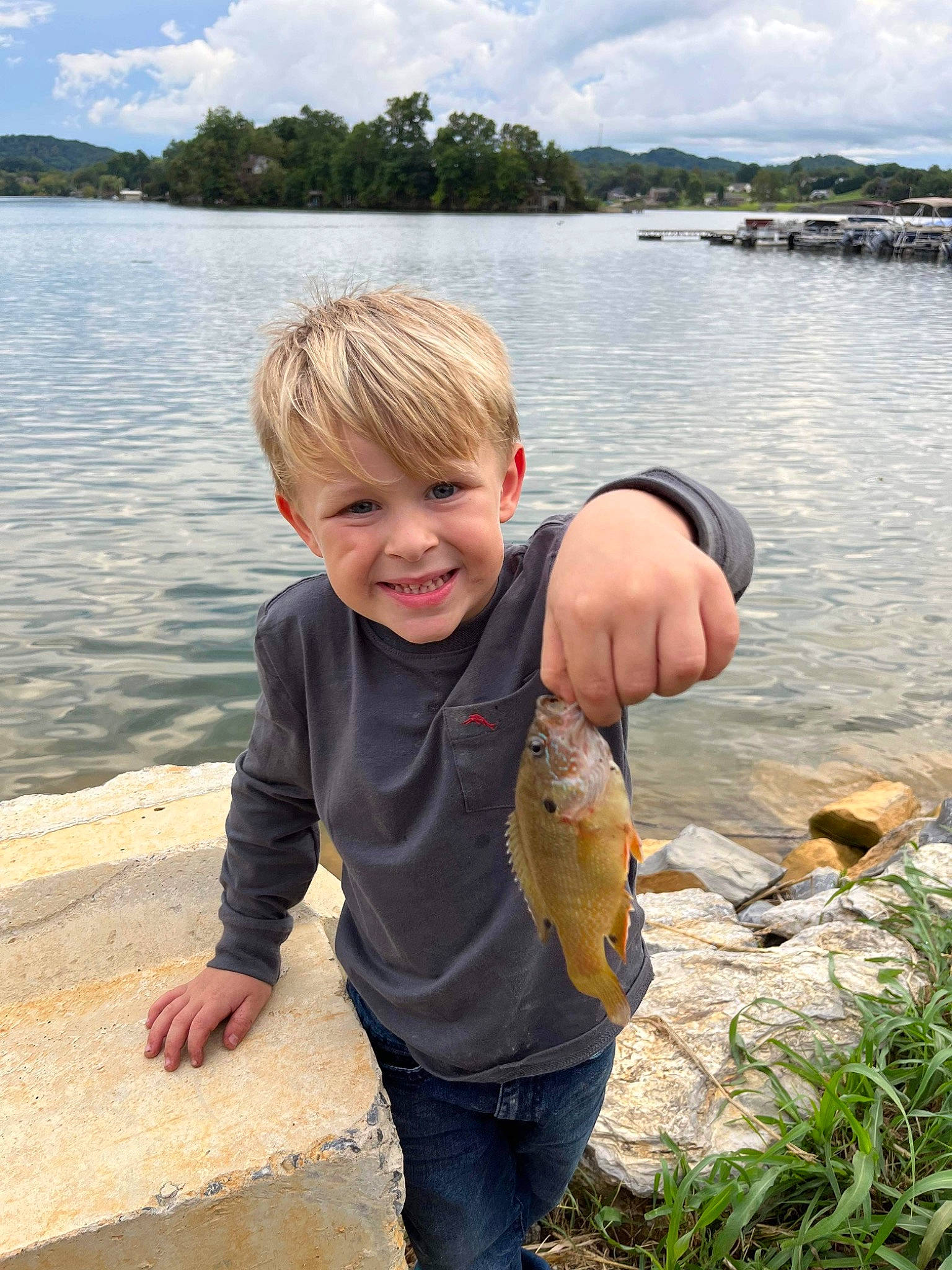 Bentley joined the competition — help win amazing prizes! bank, cloud, fish, fun, happy, joy, lake, leisure, people_in_nature, person, recreation, reservoir, seafood, shore, sky, smile, summer, t_shirt, toddler, tree