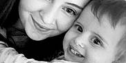 Arlia is registered to the contest to win money with this photo: black_and_white, woman, toddler, child, smiling, hug, close_up, portrait, happy, face, person, indoor, affection, love, family, cute, joyful, young, casual, clothing