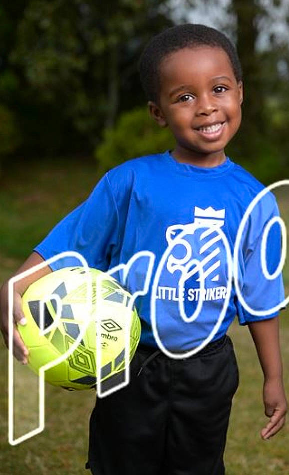 Landen joined the competition — help win amazing prizes! ball, black, electric_blue, eye, face, football, fun, grass, happy, joy, leisure, person, player, product, recreation, sleeve, smile, sports_equipment, sports_gear, t_shirt