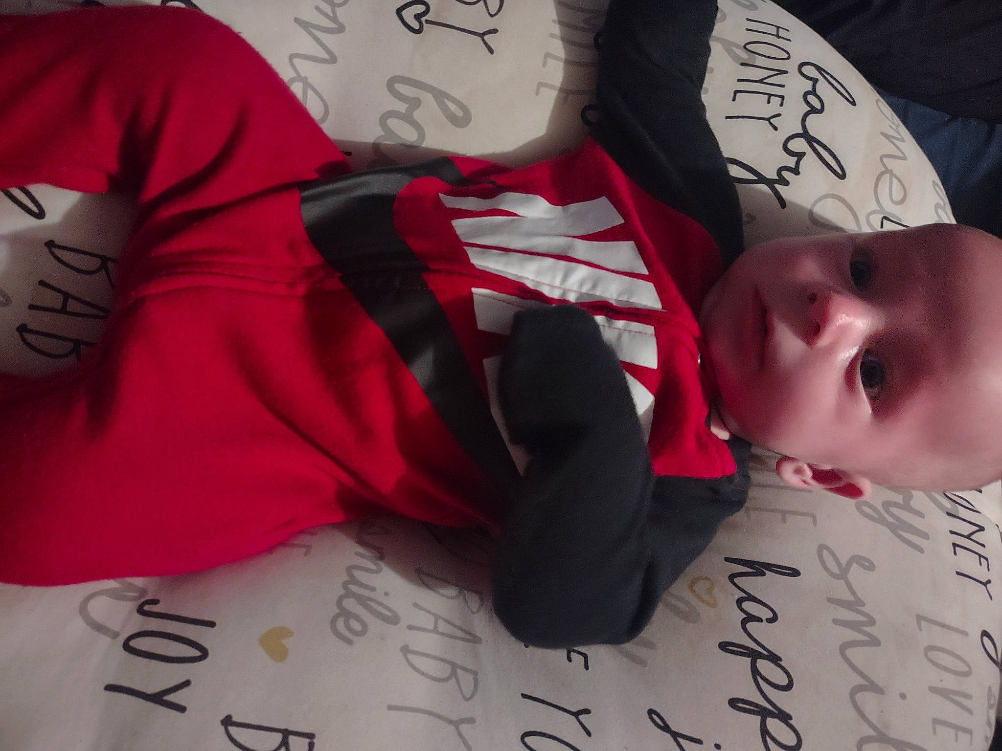 Langston is registered to the contest to win money with this photo: baby, baby_products, baby_sleeping, baby_toddler_clothing, carmine, child, comfort, cool, finger, font, handwriting, happy, linens, magenta, pattern, person, pink, product, sleeve, sportswear