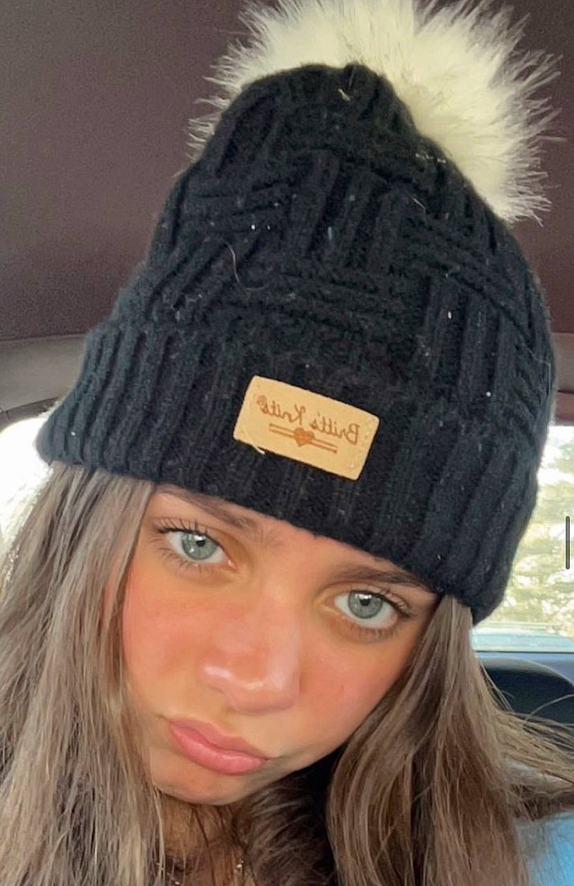 Ava is registered to the contest to win money with this photo: animal_product, beanie, beauty, black, bonnet, cap, costume_accessory, electric_blue, eyelash, fashion_accessory, fashion_design, fur, hair_accessory, hair_coloring, headgear, headwear, knit_cap, natural_material, person, winter