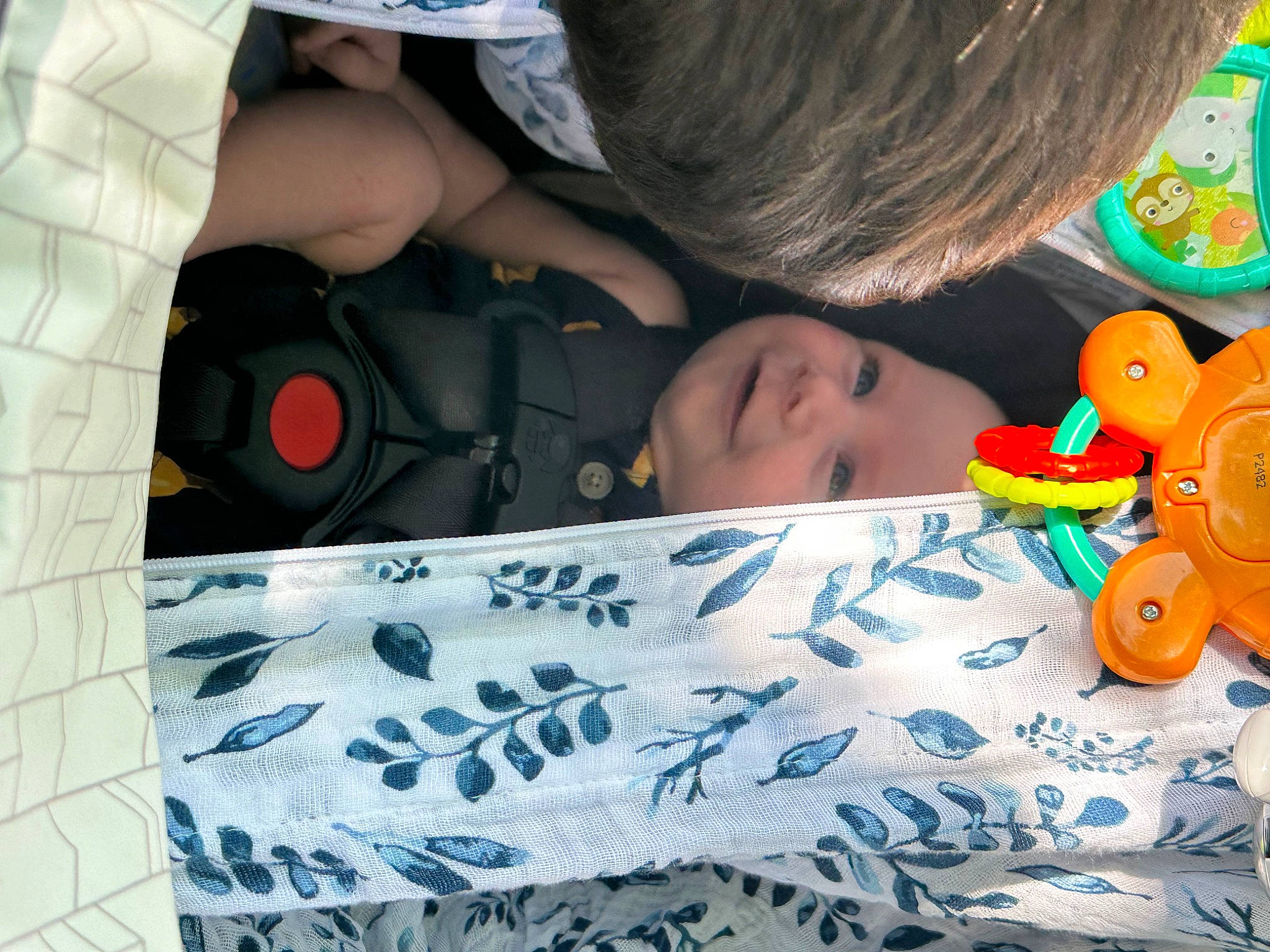 Slater is registered to the contest to win money with this photo: baby, baby_products, baby_toys, child, comfort, fun, happy, headwear, joy, linens, pattern, person, play, product, room, sitting, t_shirt, textile, toddler, toy