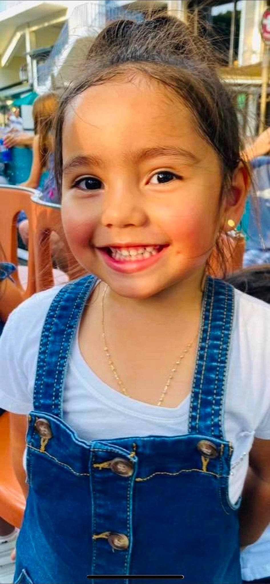 Katie Marie is registered to the contest to win money with this photo: black_hair, blue, chin, clothing, eye, eyebrow, eyelash, hair, hairstyle, happy, head, iris, joy, leisure, lip, long_hair, nose, organ, person, skin