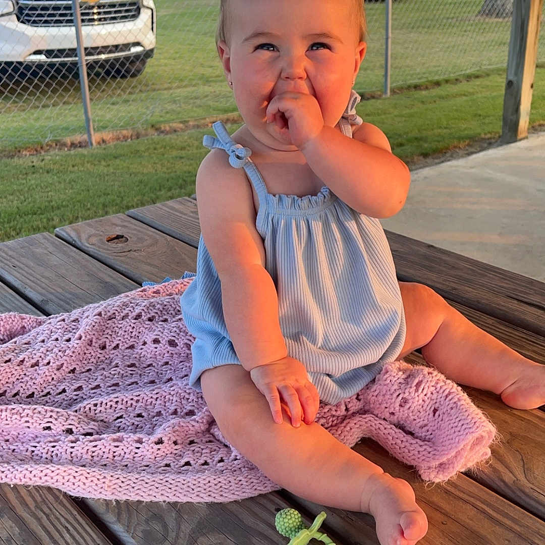 Blakely is registered to the contest to win money with this photo: architecture, baby, building, car, deck, face, grass, head, house, housing, outdoors, person, photography, plant, porch, portrait, shelter, sitting, summer, wood