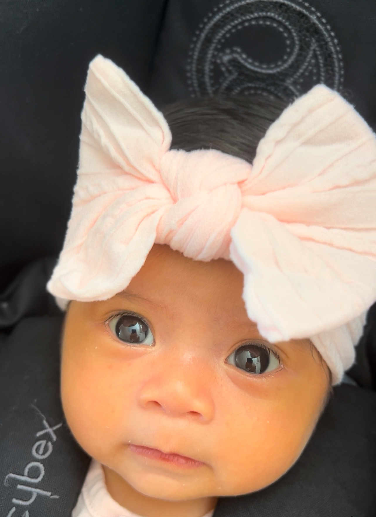 Cianna joined the competition — help win amazing prizes! baby, infant, face, headband, bow, eyes, closeup, portrait, cute, child, soft, skin, expression, looking, pink, clothing, young, adorable, person, headwear