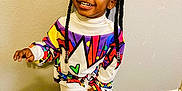 Hazel is registered to the contest to win money with this photo: baby, babylaughing, braid, child, clothing, cornrows, face, female, footwear, girl, hair, happy, head, person, shoe, sitting, sleeve, smile, standing, student