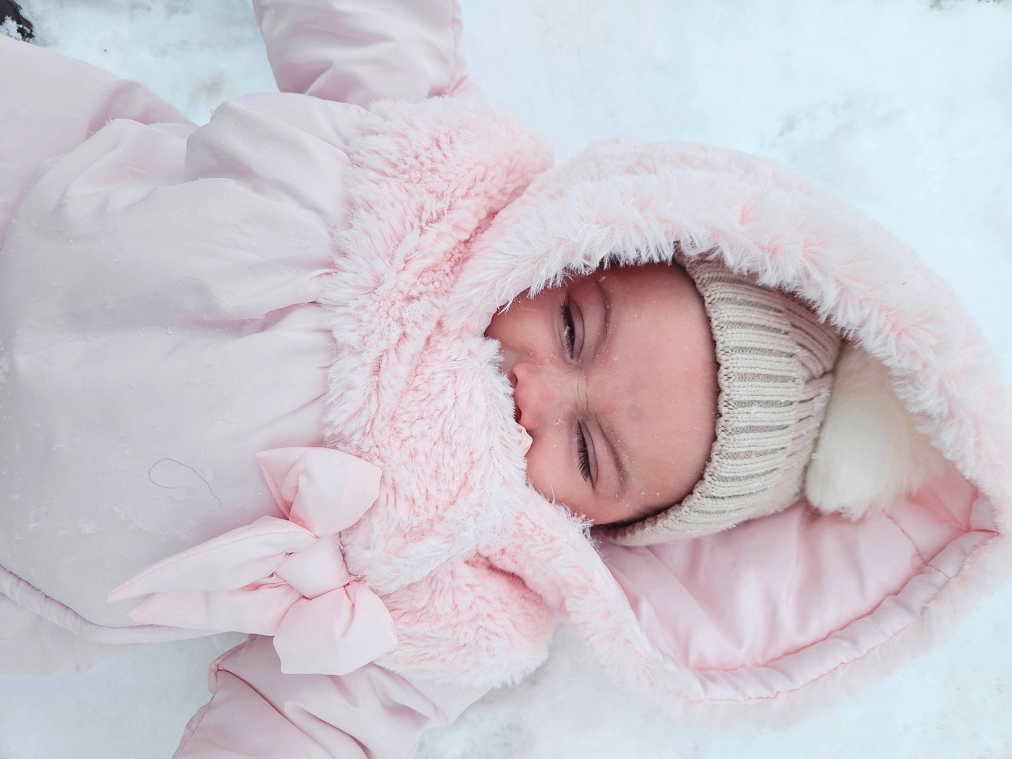 Sadie is registered to the contest to win money with this photo: baby, baby_sleeping, baby_toddler_clothing, cap, child, comfort, eyelash, face, fashion_accessory, flash_photography, fur, happy, headgear, knit_cap, linens, lip, person, pink, skin, toddler