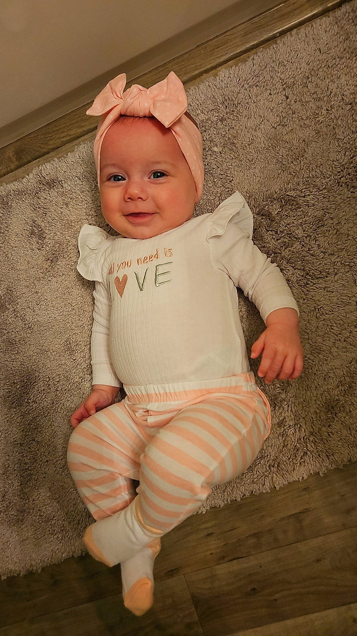 Sadie is registered to the contest to win money with this photo: baby, baby_toddler_clothing, cheek, child, chin, clothing, comfort, eye, face, happy, head, human_body, iris, joy, lip, nose, person, skin, sleeve, smile