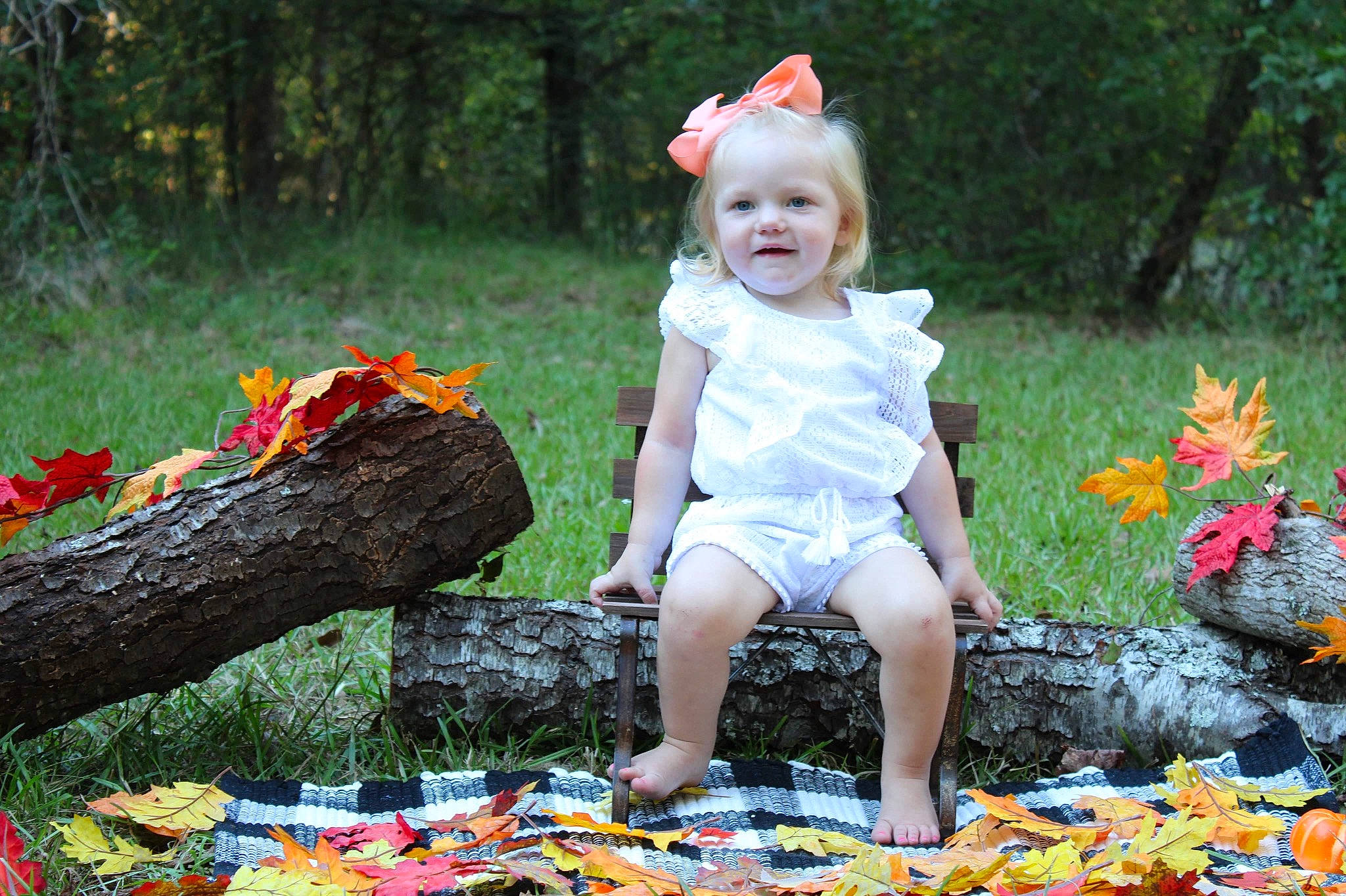 Laiklyn joined the competition — help win amazing prizes! baby_toddler_clothing, botany, child, dress, flower, grass, happy, leaf, nature, orange, people_in_nature, person, photograph, plant, red, smile, summer, toddler, tree, vertebrate