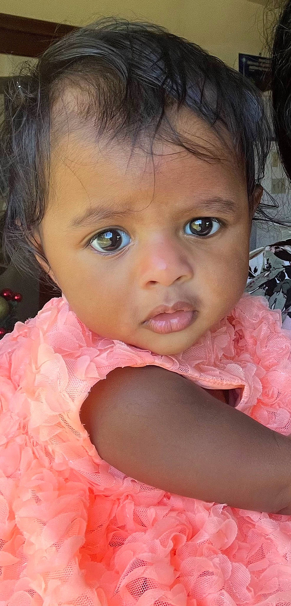 Lisa is registered to the contest to win money with this photo: baby, baby_toddler_clothing, cheek, chin, eyebrow, eyelash, face, facial_expression, flash_photography, gesture, happy, iris, lip, mouth, nose, person, pink, skin, sleeve, smile