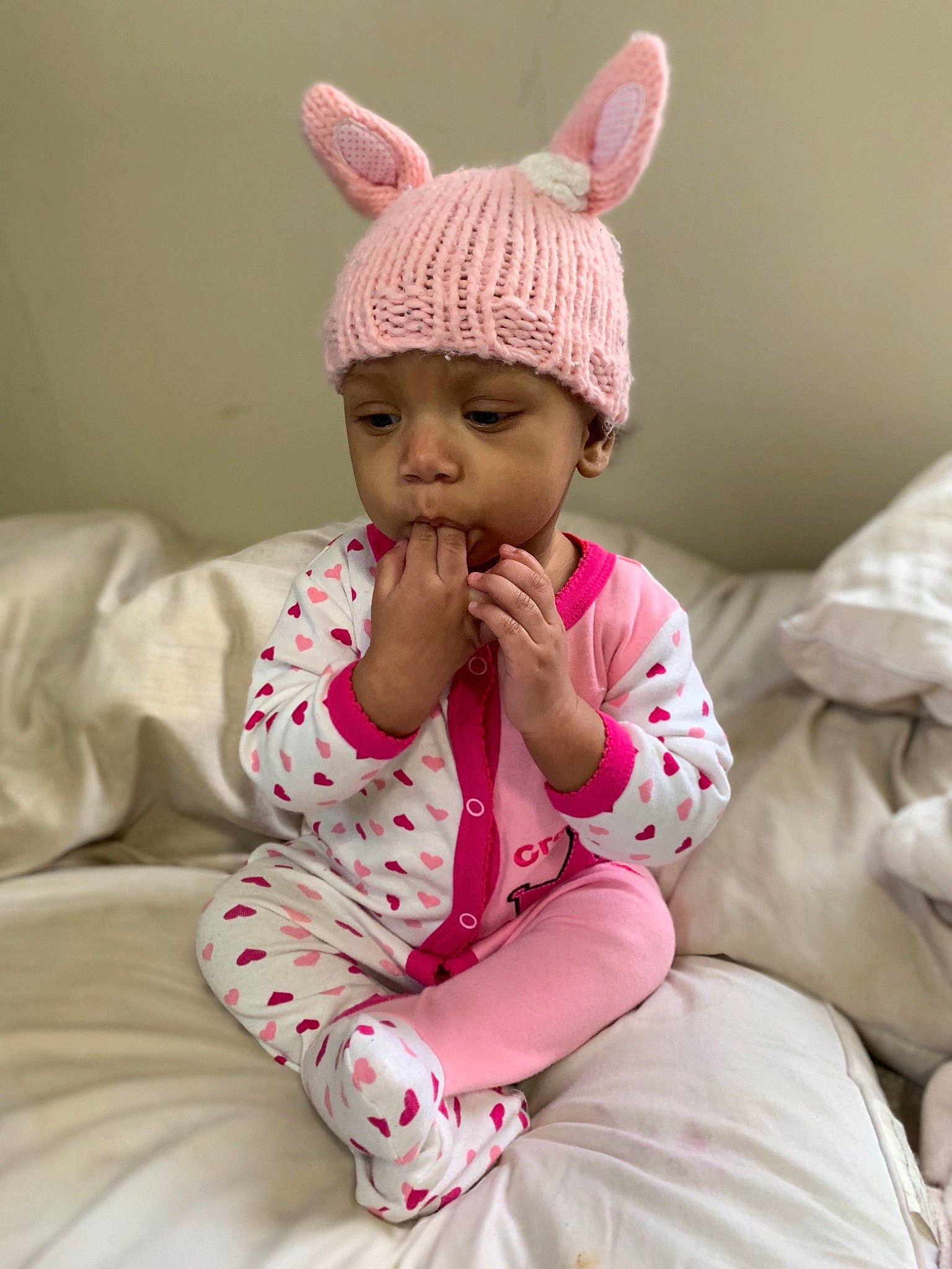 Lorianna joined the competition — help win amazing prizes! baby, baby_toddler_clothing, beanie, cap, child, crochet, dress, ear, headgear, headwear, knit_cap, lip, person, pink, skin, sleeve, toddler