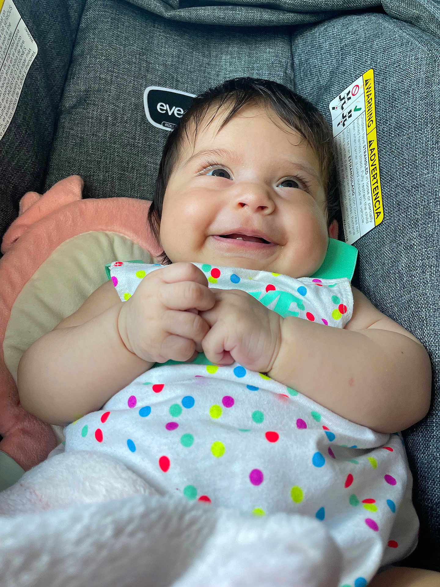 Genesis Andrea Muñoz is registered to the contest to win money with this photo: baby, child, smiling, polka_dot, colorful_clothing, infant, happy, cute, hands, face, cushion, carrier, fabric, soft, indoor, portrait, closeup, skin, head, eyes