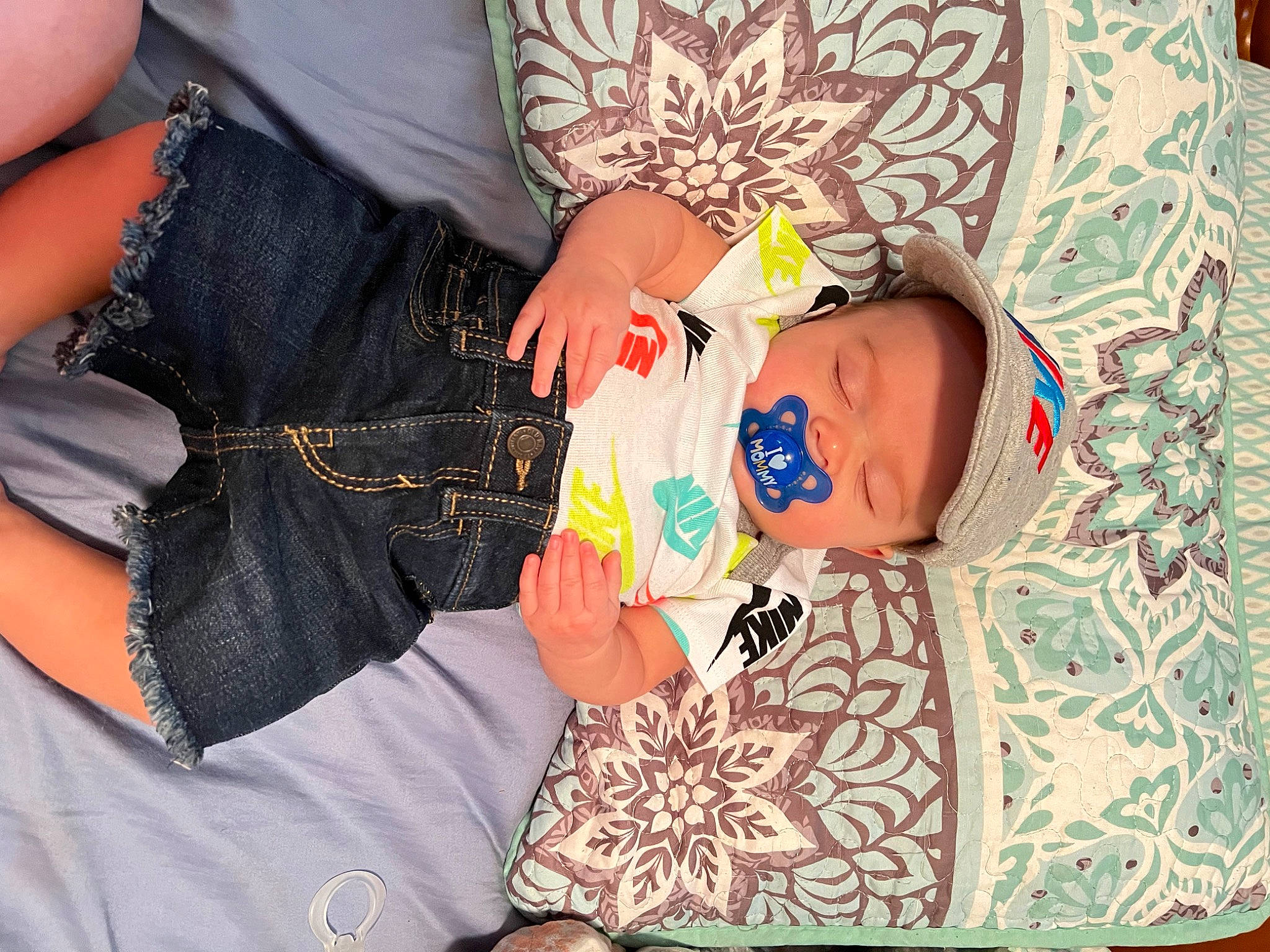 Nehemiah is registered to the contest to win money with this photo: baby, baby_toddler_clothing, child, elbow, fun, gesture, hairstyle, happy, hat, headwear, human_leg, nail, pattern, person, sunglasses, t_shirt, textile, thigh, toddler, trunk