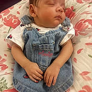 Amelia joined the competition — help win amazing prizes! baby, sleeping, denim_dress, minnie_mouse, infant, child, hands, face, floral_blanket, cute, peaceful, resting, young_child, soft_lighting, portrait, indoors, clothing, small_hands, head, skin