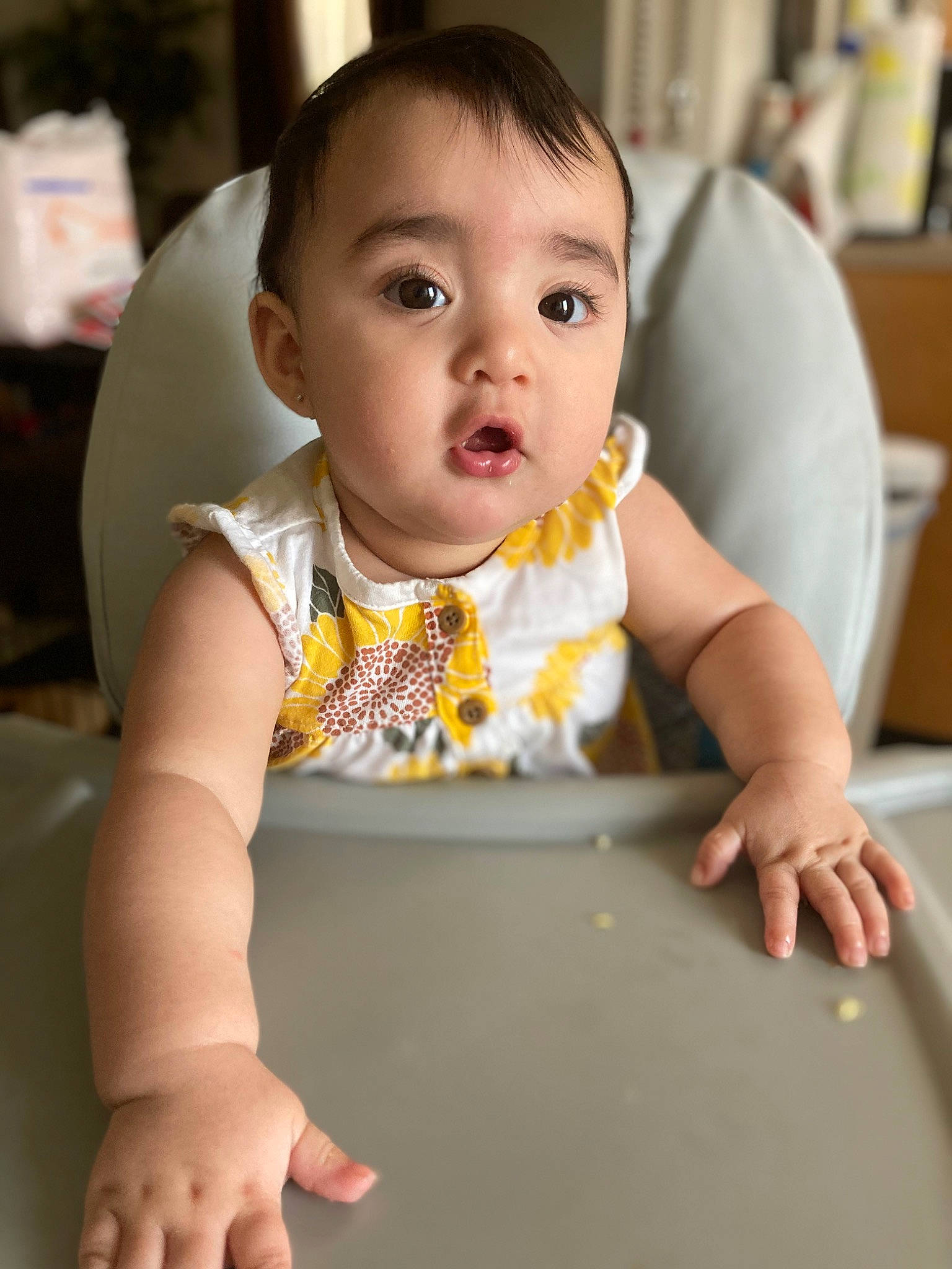 Avery joined the competition — help win amazing prizes! baby, baby_toddler_clothing, bib, cheek, child, chin, collar, face, facial_expression, finger, flooring, fun, happy, iris, neck, person, product, sitting, skin, sleeve
