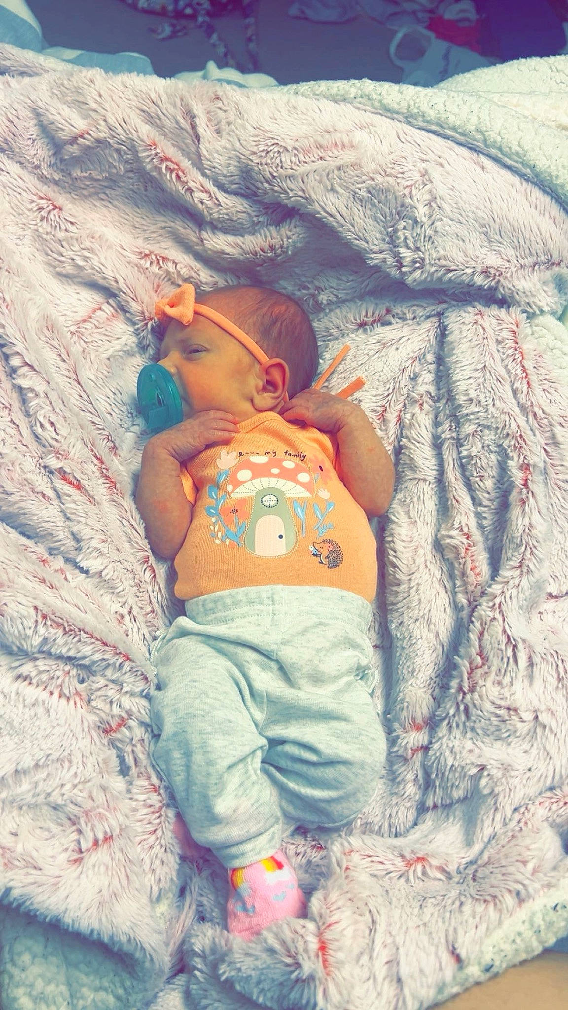 Oakley is registered to the contest to win money with this photo: abdomen, azure, baby, baby_toddler_clothing, child, denim, fun, grass, happy, headwear, landscape, pattern, people_in_nature, person, rock, sand, sitting, t_shirt, toddler, tree