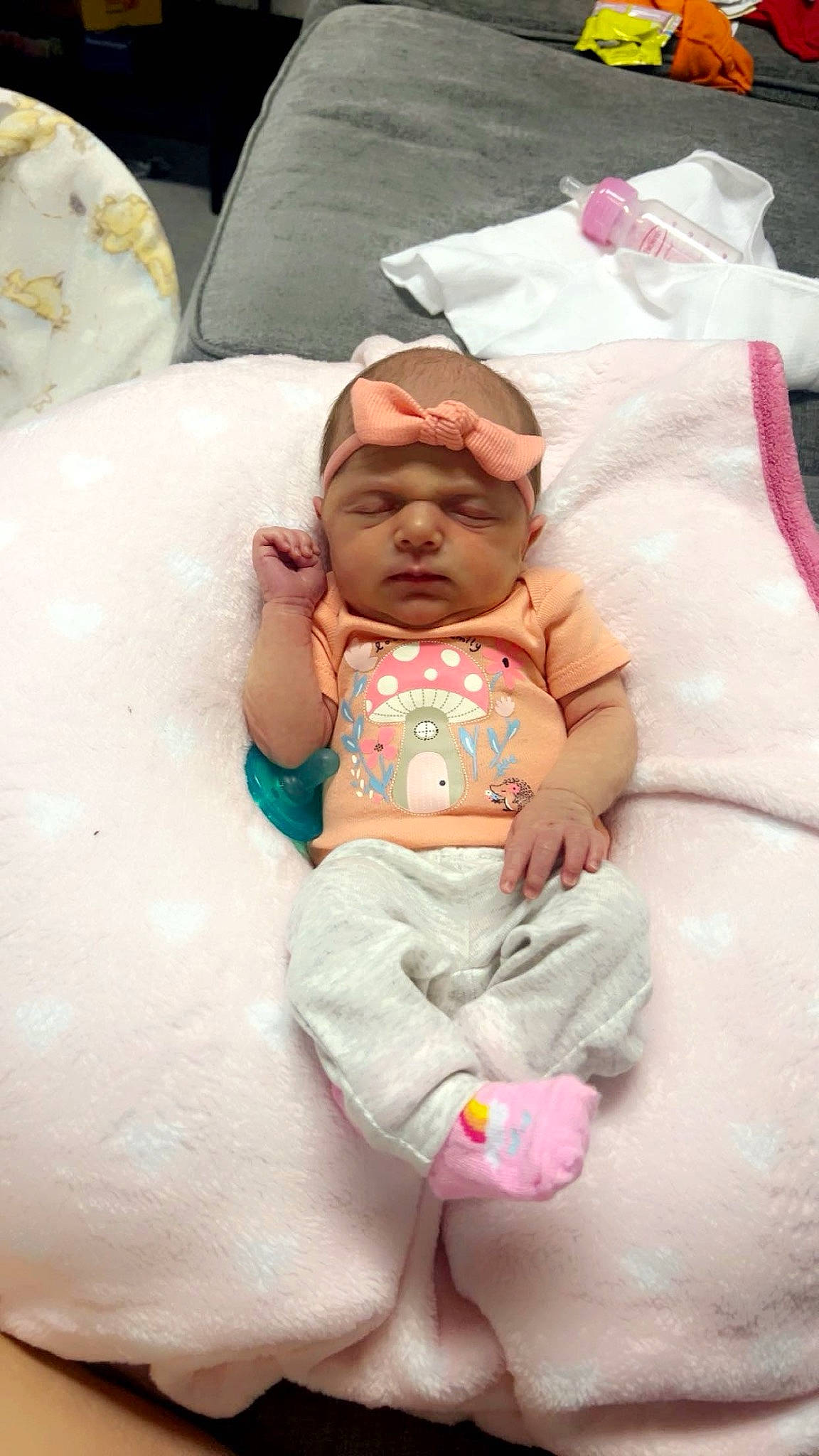 Oakley joined the competition — help win amazing prizes! abdomen, arm, baby, baby_products, baby_sleeping, baby_toddler_clothing, bedding, cheek, child, comfort, diaper, event, fun, headwear, linens, mouth, person, pink, sitting, skin