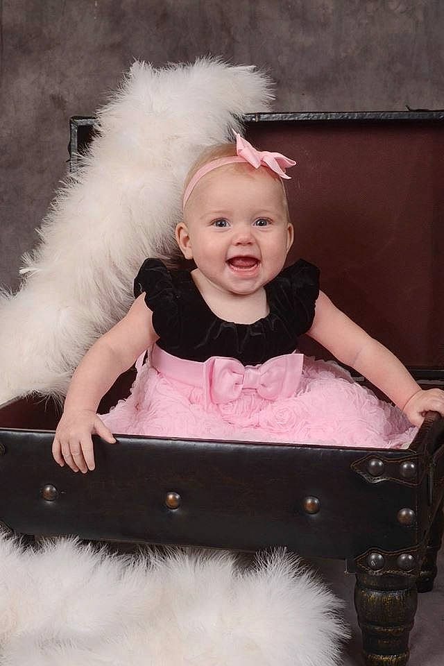 Brooklyn is registered to the contest to win money with this photo: child, costume, fun, fur, girl, hair_accessory, infant, person, pink, product, skin, smile, textile, toddler, white