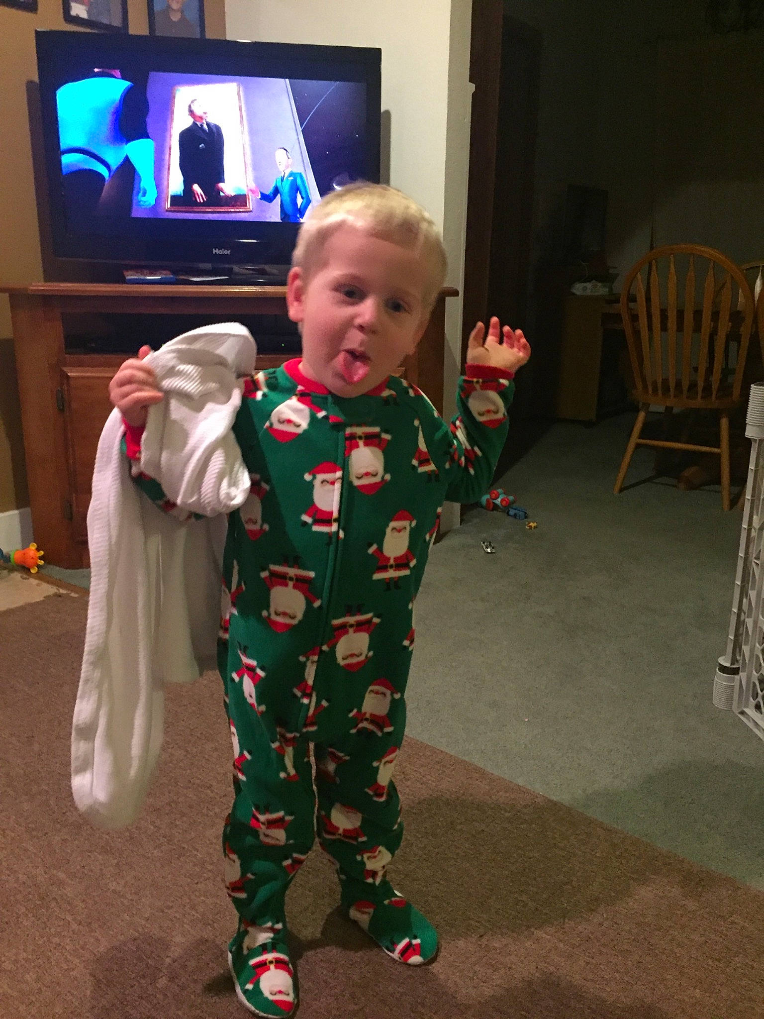 Charlie is registered to the contest to win money with this photo: child, clothing, costume, day, event, flooring, fun, girl, holiday, mammal, outerwear, person, play, product, standing, toddler