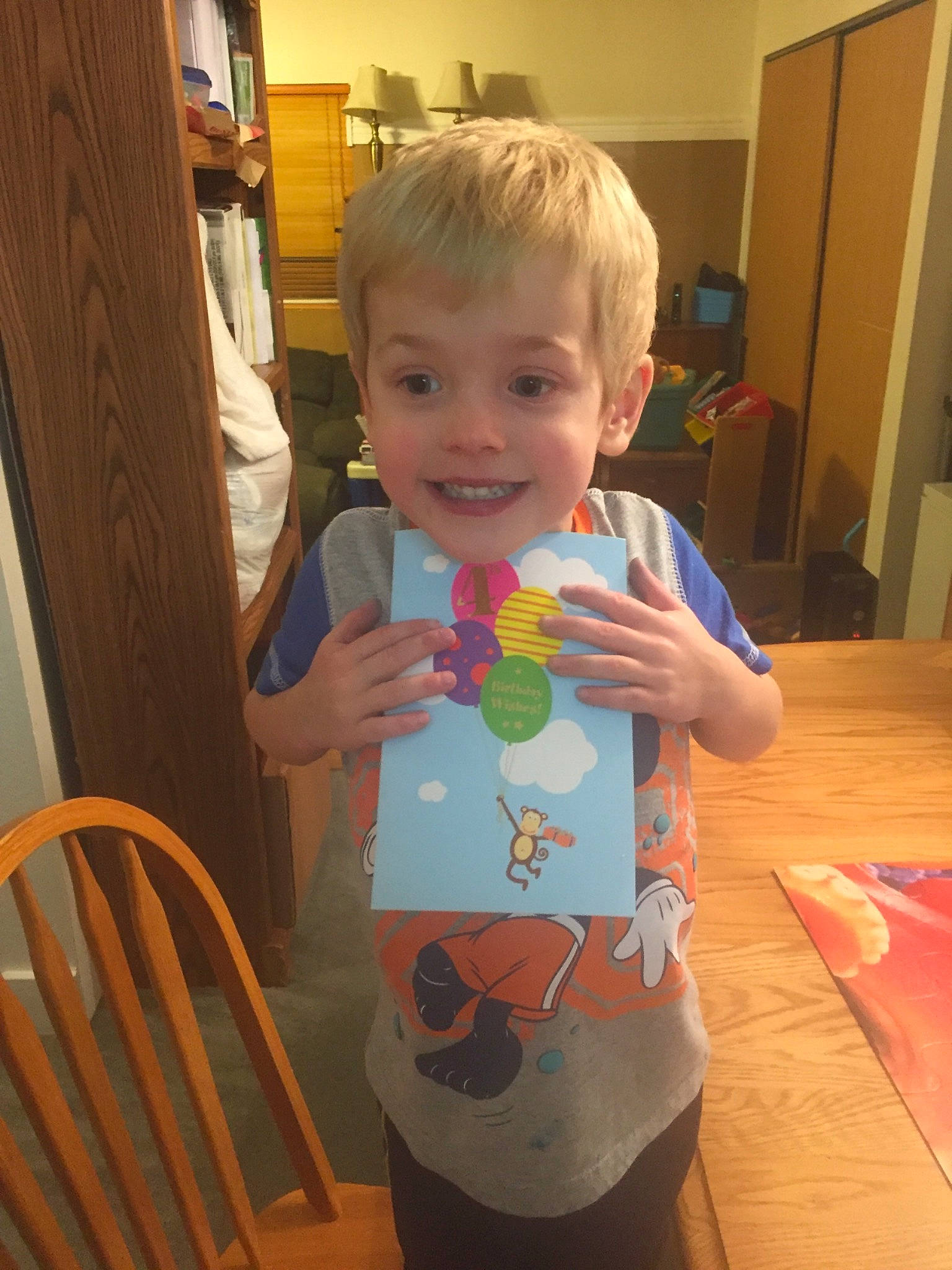 Quinton is registered to the contest to win money with this photo: arm, blond, child, day, fun, girl, hair, human_hair_color, infant, iris, joy, organ, person, play, product, skin, smile, standing, t_shirt, textile